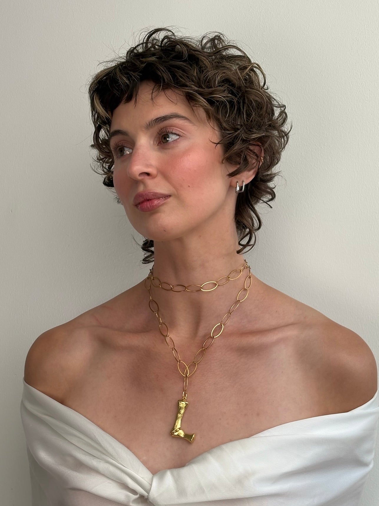 THE INITIAL NECKLACE