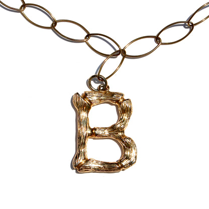 THE INITIAL NECKLACE