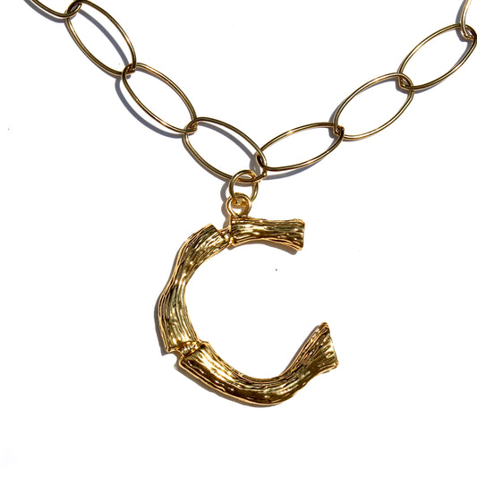THE INITIAL NECKLACE
